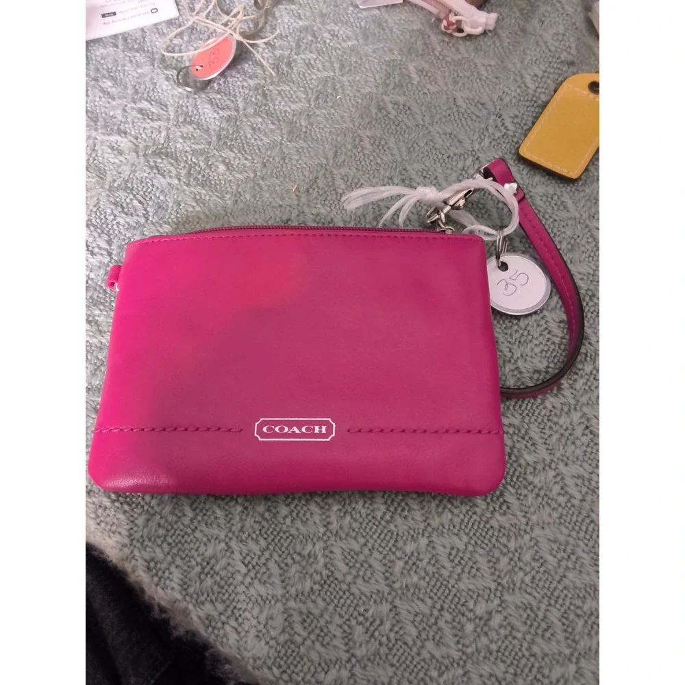 35. Coach Magenta Pink Leather Wristlet Zip Top Pouch Wallet Silver Logo